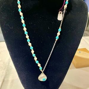 Handmade necklace with turquoise and white beads